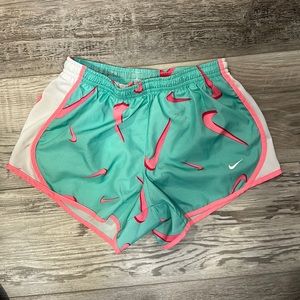 Nike running shorts, great condition but w/stains that blend in w/pattern, lined